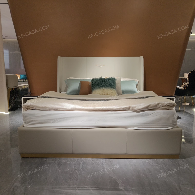 Light Beige Upholstered Bed with Brand Emblem & Gold Stainless Steel Base